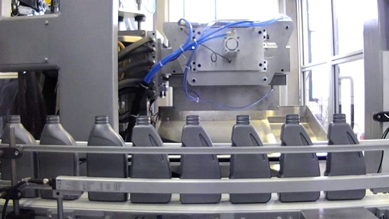 Techne packaging lubricant production conveyor belt